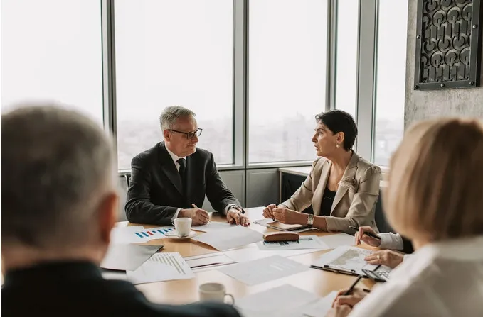 Attorneys reviewing matters together at a conference table